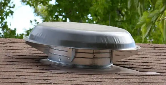 attic fan installation services with low-profile roof ventilation unit in Overland Park, KS