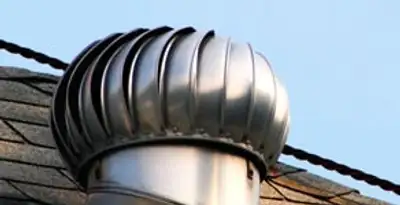 attic fan installation services with professionally installed roof ventilation unit in Overland Park, KS