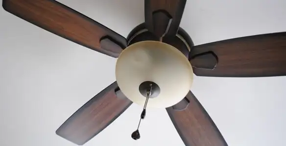 Fully installed ceiling fan with balanced blades and light fixture in Overland Park, KS