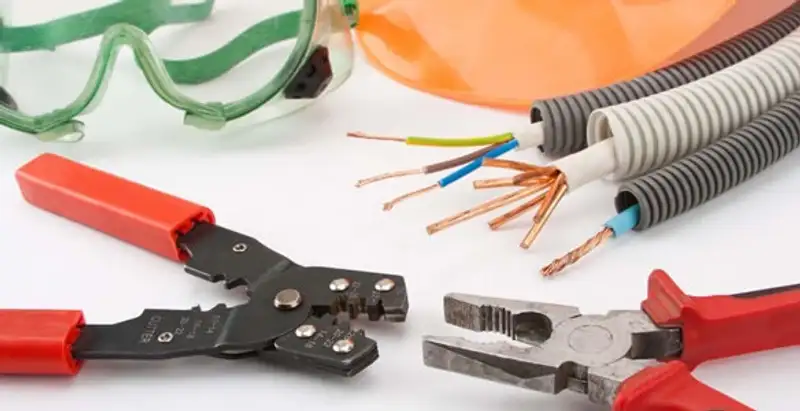 Electrical wiring repair with professional tools and safety equipment in Lenexa, KS