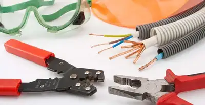 Electrical wiring repair with professional tools and safety equipment in Stilwell, KS