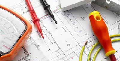 licensed electrician planning and testing electrical systems using professional tools in Overland Park, KS