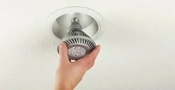 lighting installation service featuring recessed ceiling light installed by licensed professionals in Overland Park, KS