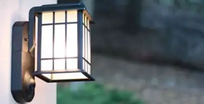 security light installation services with professionally mounted exterior wall light in Overland Park, KS