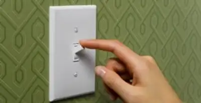 Professional switch repair service ensuring safe and reliable light control in Overland Park, KS