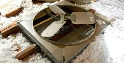 whole house fan installation services with attic-mounted ventilation unit in Overland Park, KS